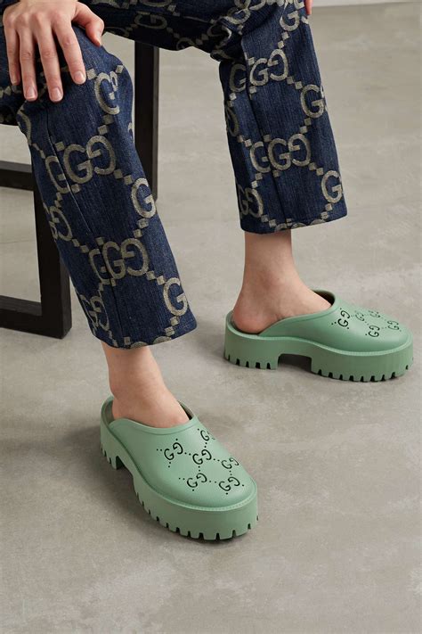 gucci clog mules|GUCCI Elea perforated rubber platform mules .